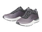 Une paire de chaussures de running Crivit noires et grises avec une semelle blanche.