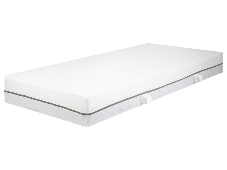 Un matelas blanc avec des détails gris.