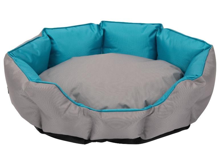 Coussin pour chien gris et turquoise.