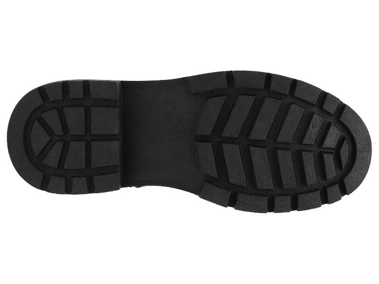 Semelle noire d'une botte avec un motif de bande de roulement prononcé.