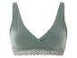 Un soutien-gorge vert avec de la dentelle.