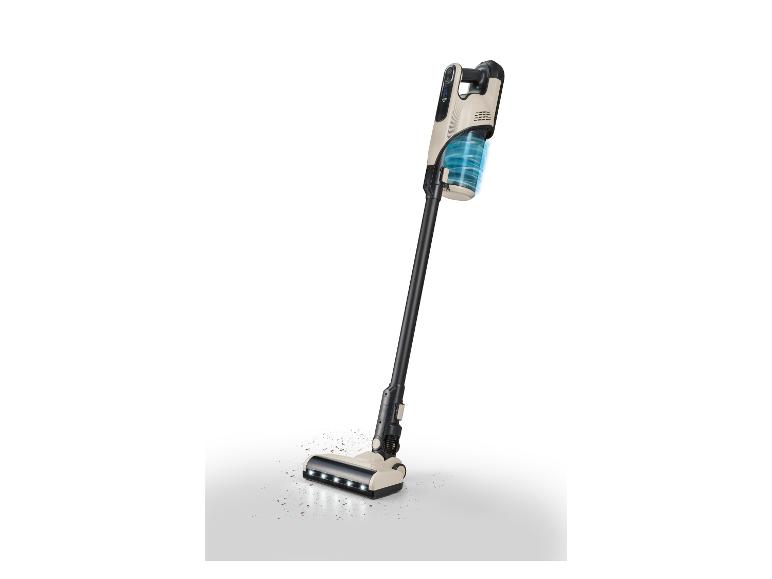 Un aspirateur sans fil avec une batterie rechargeable et une buse éclairée.