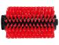 Brosse cylindrique rouge à poils rigides pour nettoyage industriel.