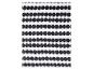Une couverture blanche avec un motif de pois noirs.