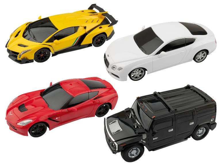 Quatre voitures jouets : Lamborghini jaune, Bentley blanche, Corvette rouge et Hummer noir