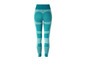 Leggings turquoise avec un motif géométrique.