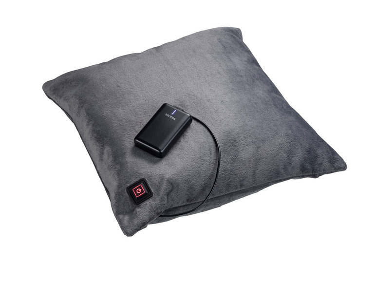 Un coussin chauffant gris avec une batterie externe Sanitas.