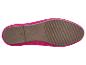 Semelle de chaussure plate fuchsia avec texture antidérapante.