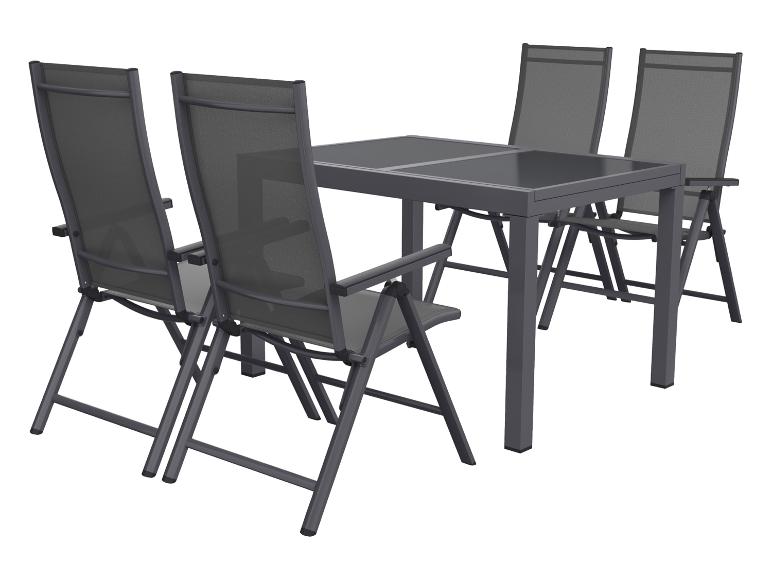 Ensemble de salle à manger de jardin gris foncé avec table rectangulaire et quatre chaises pliantes.