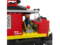 Train jouet rouge avec une figurine de conducteur à l'intérieur.