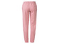 Pantalon de survêtement rose avec ceinture élastique.
