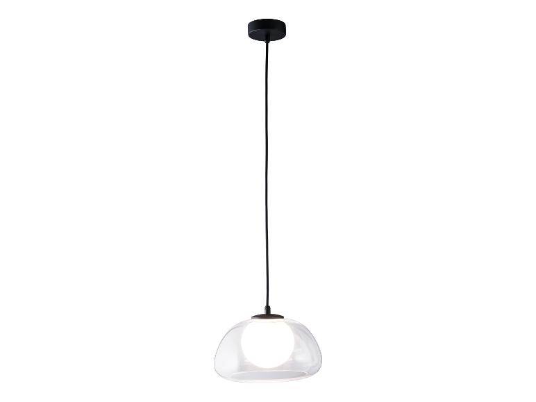 Un luminaire suspendu noir avec un abat-jour rond en verre.