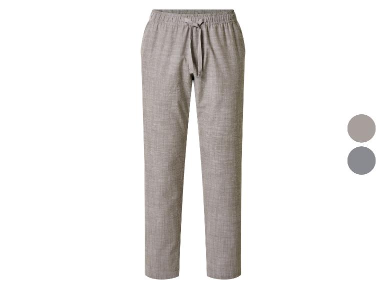 Pantalon de pyjama ou de détente gris pour homme avec cordon de serrage à la taille.
