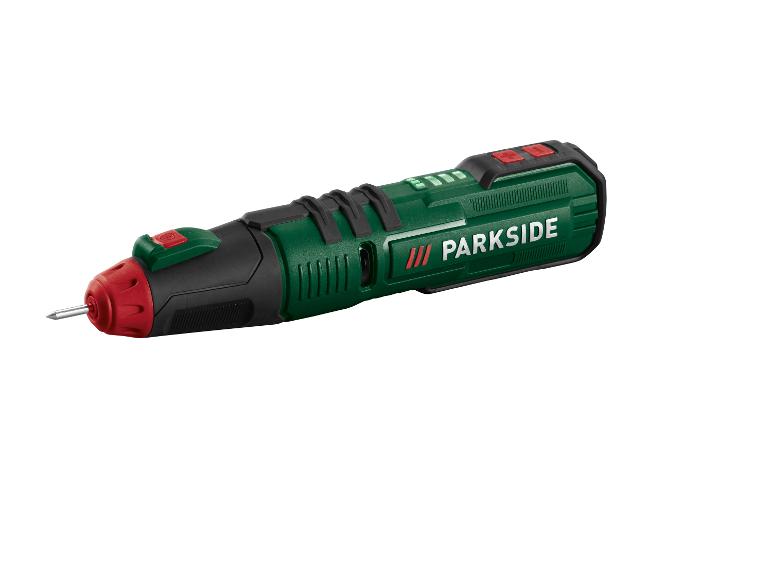 Une perceuse Parkside verte avec une poignée rouge.