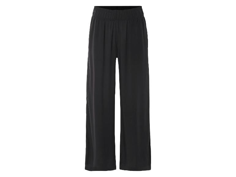 Pantalon noir ample, style élégant.