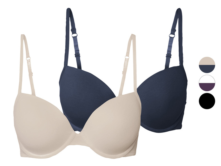 Deux soutiens-gorge, un beige et un bleu foncé.