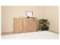 Commode en bois avec deux portes et un tiroir.