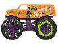Un monster truck orange avec de grandes roues et un thème de joker.