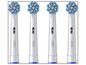 Quatre têtes de brosse à dents électriques Oral-B.