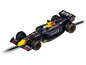 Une maquette de voiture de course de Formule 1 noire et jaune avec les sponsors Oracle et Bybit.