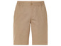 Short beige avec ceinture élastique.
