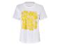 T-shirt blanc avec un imprimé de fleurs jaunes.