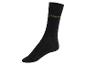 Une chaussette noire avec le mot 'Thursday'