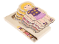 Puzzle en bois en couches montrant l'anatomie humaine.