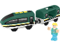 Train jouet vert avec wagon et figurine de personne