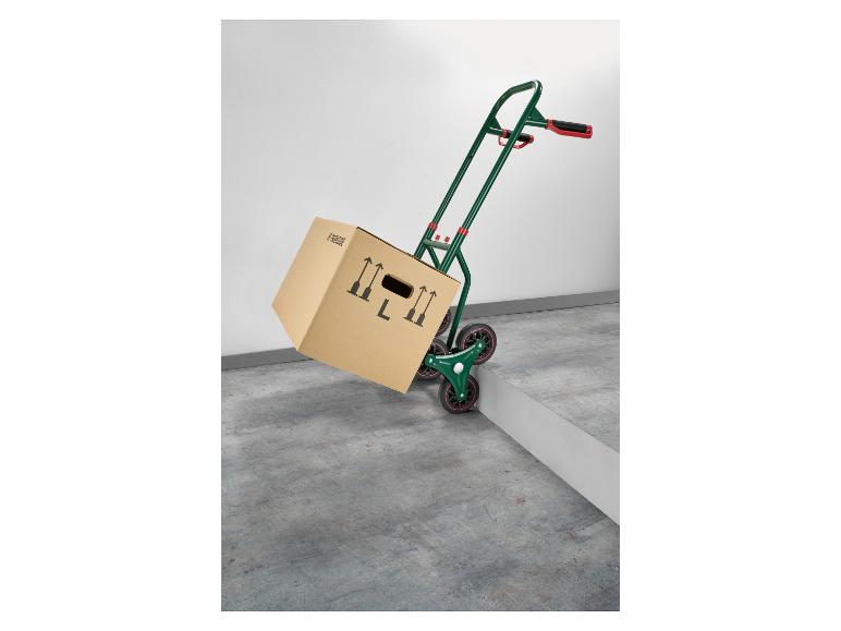 Diable monte-escalier PARKSIDE avec une boîte en carton sur un sol en béton.