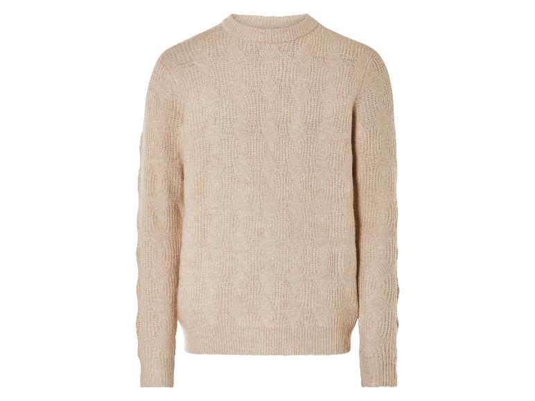 Pull en maille beige avec un motif de câble.