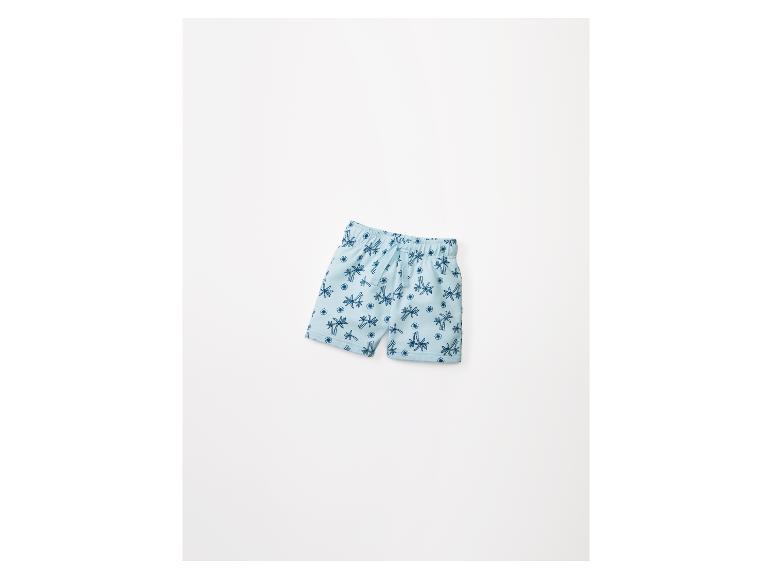 Shorts enfant à motif palmier.