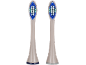 Deux têtes de brosse à dents électrique avec des poils bleus, blancs et turquoises.
