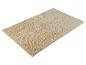 Tapis de bain beige texturé.