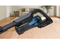 Aspirateur sans fil avec technologie cyclonique et batterie 24V 4.0Ah sur parquet.
