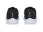 Paire de baskets Crivit noires et blanches.