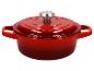 Cocotte en fonte émaillée rouge avec couvercle et bouton métallique