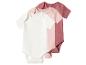 Trois bodys de bébé à manches courtes en blanc, rose clair et rose foncé.