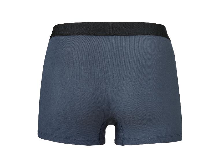 Caleçon boxer bleu foncé avec ceinture élastique noire, vue arrière