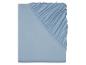 Drap-housse bleu clair avec élastique.