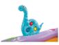 Dinosaure gonflable bleu avec des balles colorées sur une piscine gonflable.