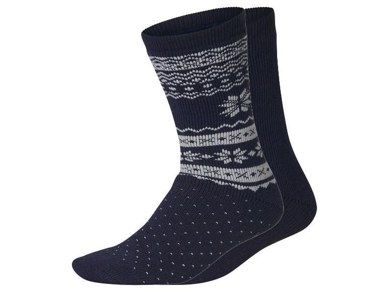 Paire de chaussettes bleu marine avec motif jacquard blanc et picots antidérapants