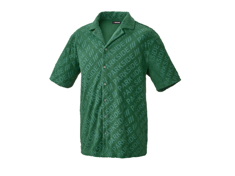 Chemise verte à manches courtes avec motif logo répété.