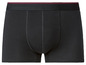 Boxers noirs avec une bande rouge.