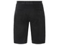 Shorts chino noirs avec ceinture.