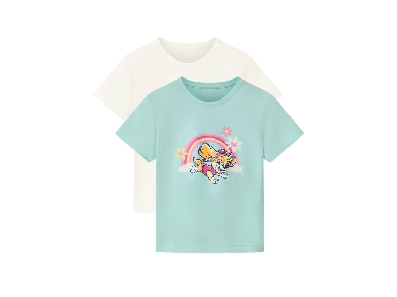Deux t-shirts pour enfants, un crème et un bleu clair avec un imprimé de Skye de la Pat' Patrouille.