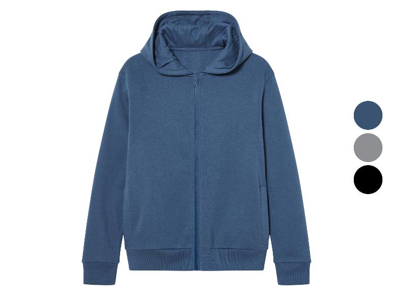 Un sweat-shirt à capuche bleu avec une fermeture éclair.