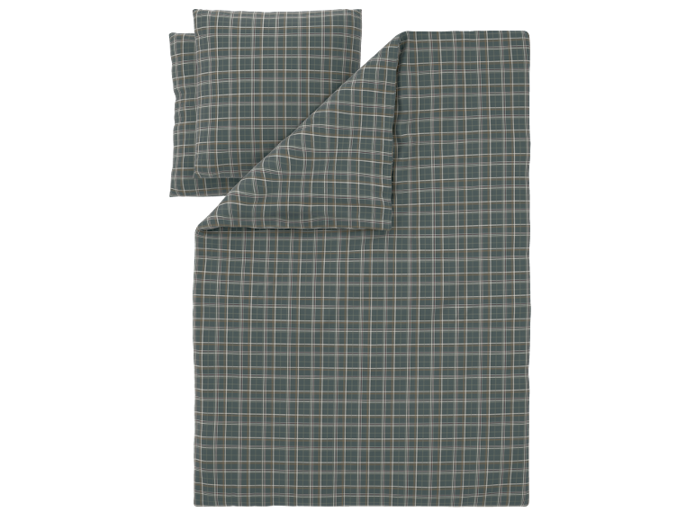 Parure de lit à carreaux bleu-gris avec taies d'oreiller.