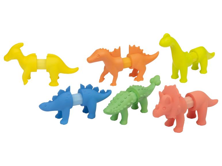 Six jouets dinosaures colorés avec des parties du corps détachables.