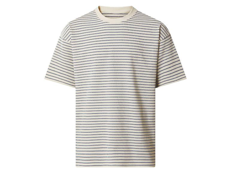 T-shirt rayé texturé à manches courtes en blanc et bleu.